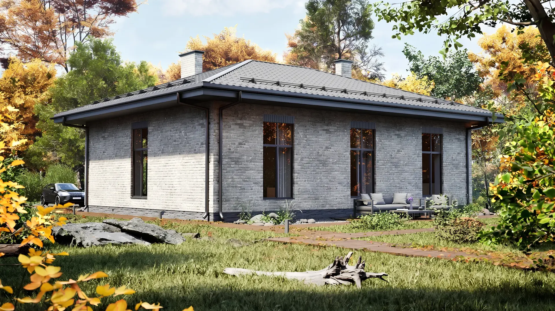 Боковой фасад одноэтажного дома с кирпичной отделкой и длинной кровлей